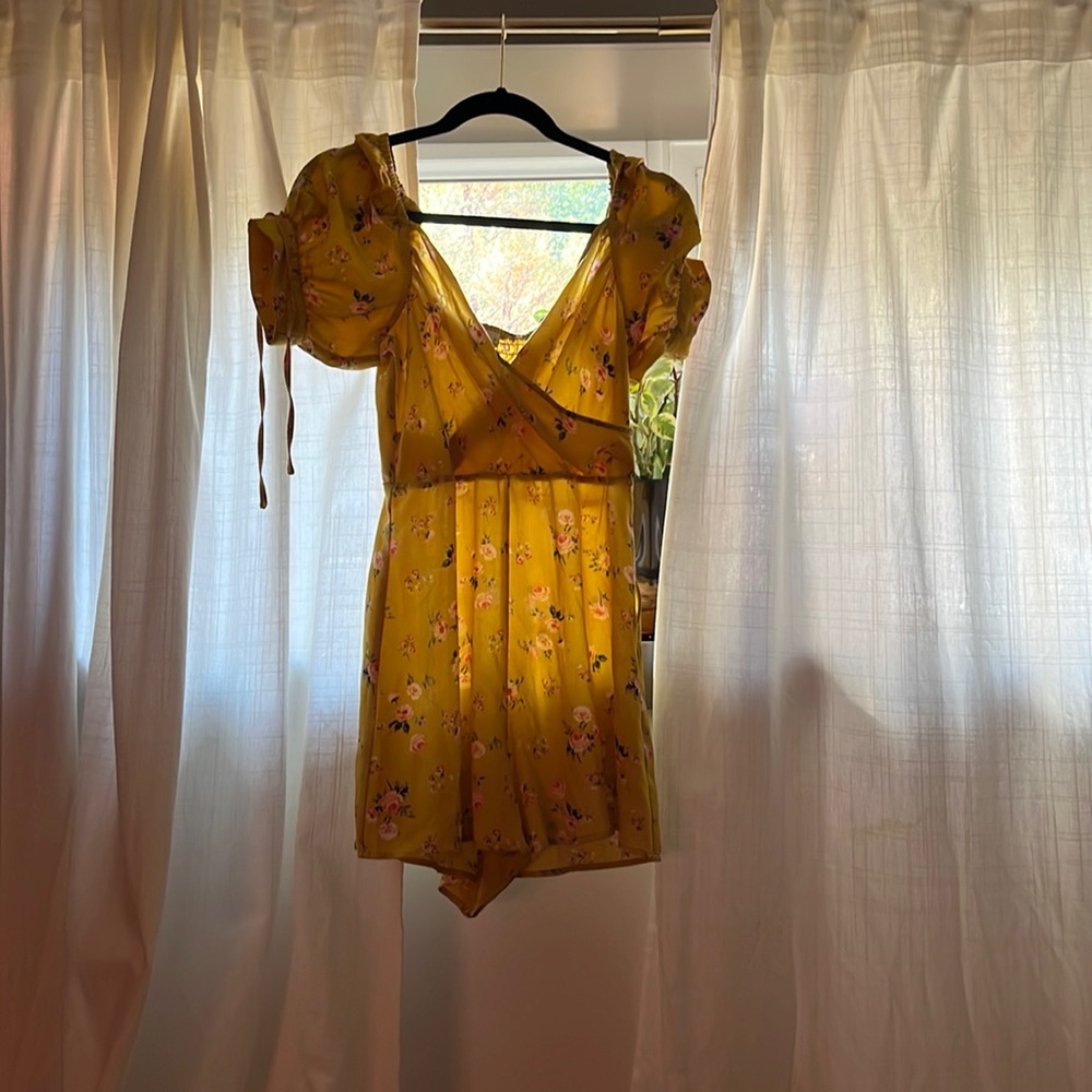 Romper size medium, perfect for everyday or a concert look